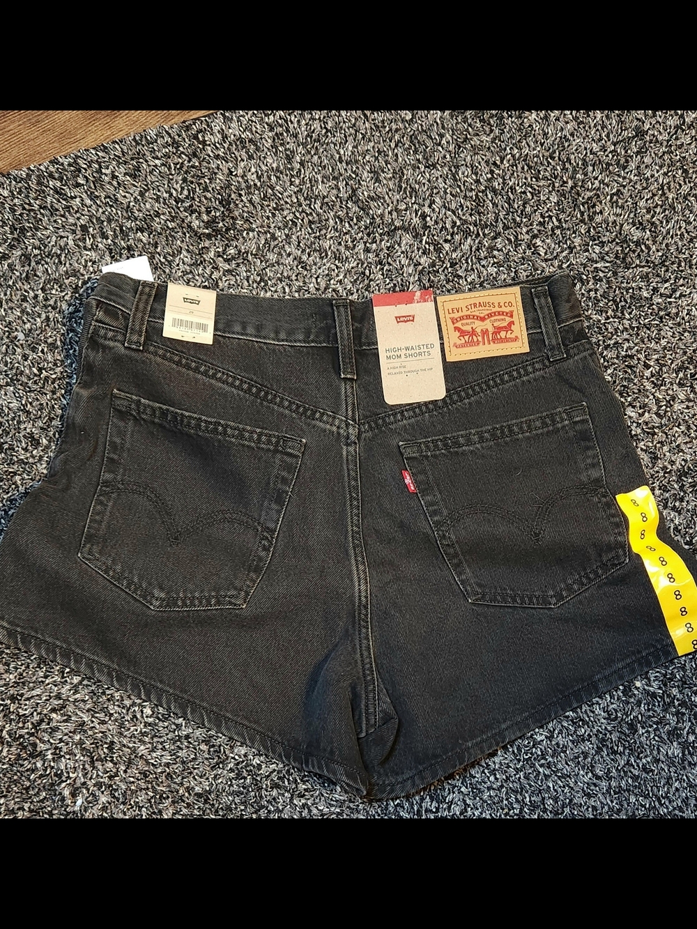 Levi's High-Waisted Mom Shorts in Washed Black Denim - Picture 2 of 6